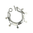 A double strand bracelet with a circular toggle closure, one row of varied stainless steel links, rectangular gray marble stones and shell pearls and geometric stainless steel drops along with a solid strand of sleek stainless steel metal chain.