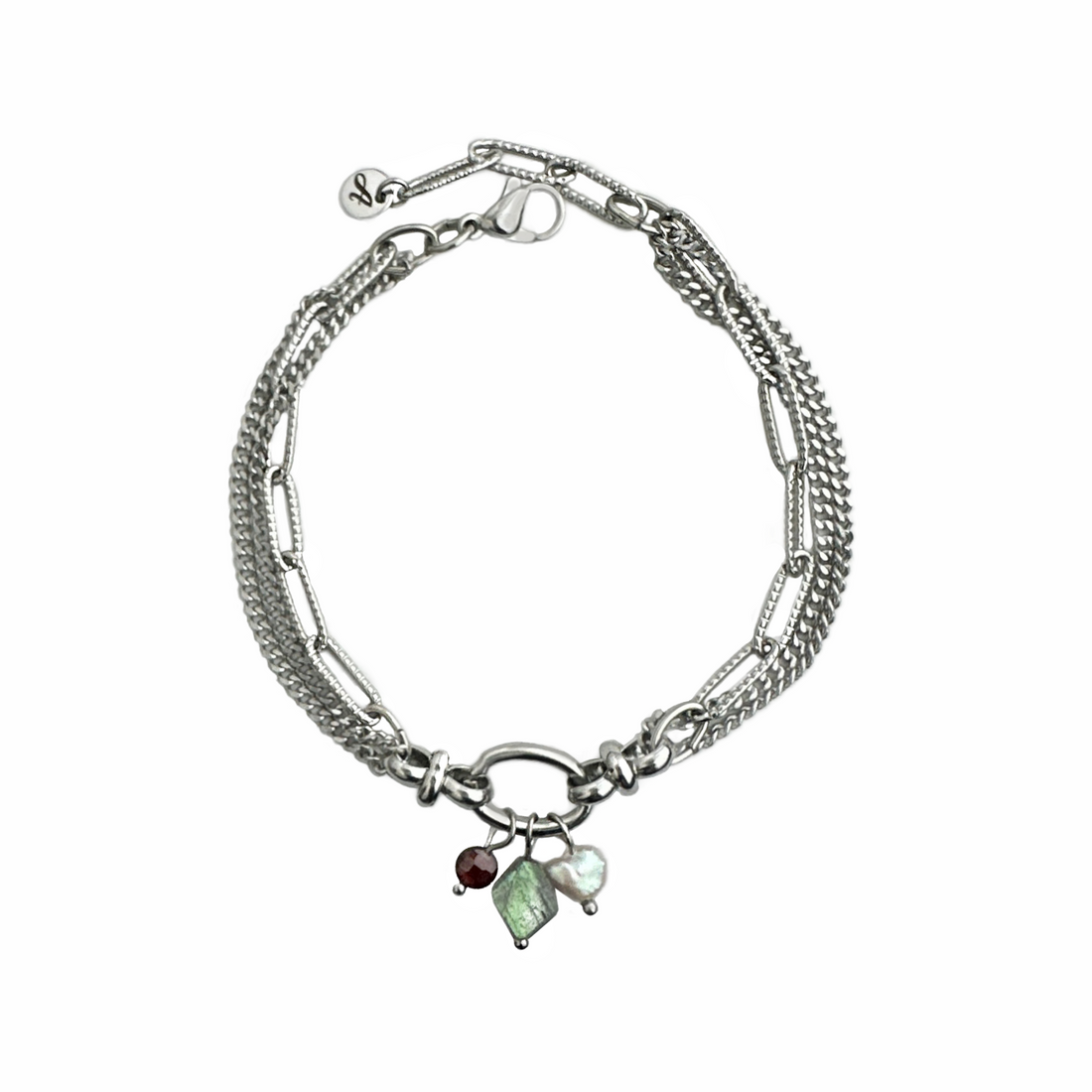 A silver tone stainless steel bracelet of three rows of chain with a freshwater pearl and labradorite and garnet stones dangling from a center oval link. Handcrafted by Alysian.