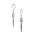 A pair of silver-tone earrings featuring rectangular freshwater pearls, antique silver-plated textural chain with silver-plated hematite stones and stainless steel ear wires. Handcrafted by Alysian. 