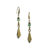 A textural deco-inspired pair of long drop earrings featuring green strawberry quartz and pyrite stones, brass links with layered silver-plated brass and vintage brass charms. Handcrafted by Alysian. 