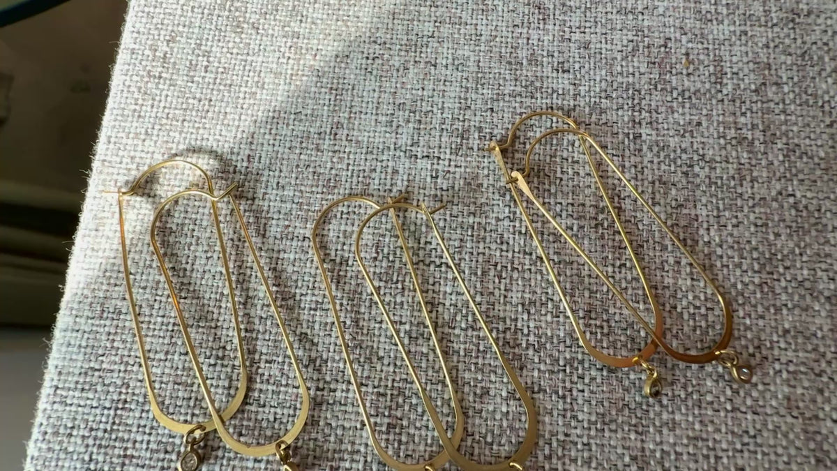 Three pairs of Fawn Hoops with glistening tiny zircon gemstone drops, handcrafted by Alysian.