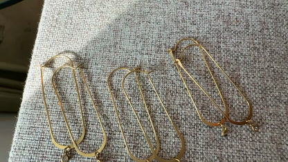 Three pairs of Fawn Hoops with glistening tiny zircon gemstone drops, handcrafted by Alysian.