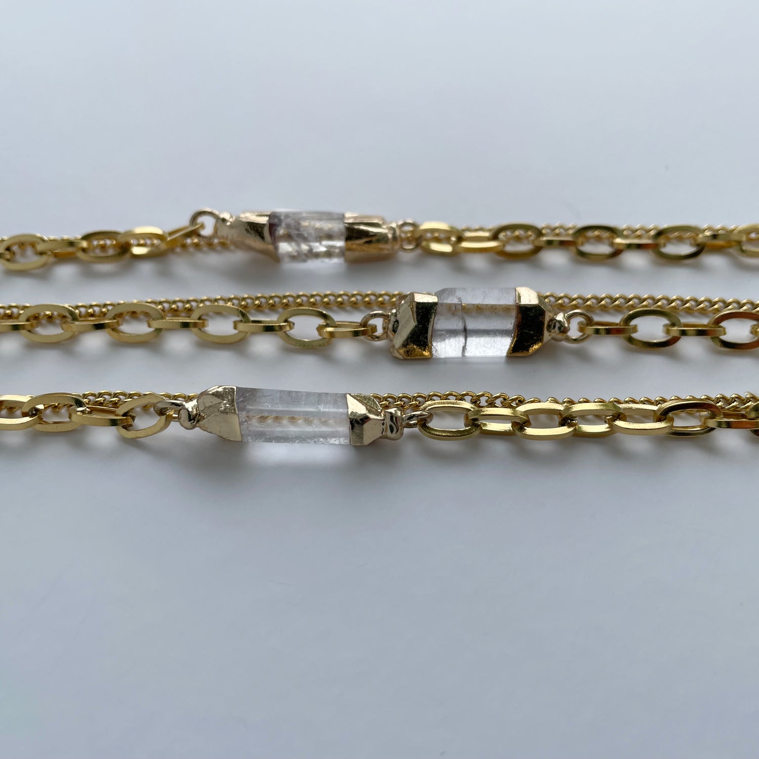 Aella Clear Quartz Bracelet – Gold Tone – A handcrafted bracelet by Alysian.